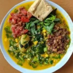 Tinutuan Manado dengan Sambal Roa Pedas yang Menggugah Selera